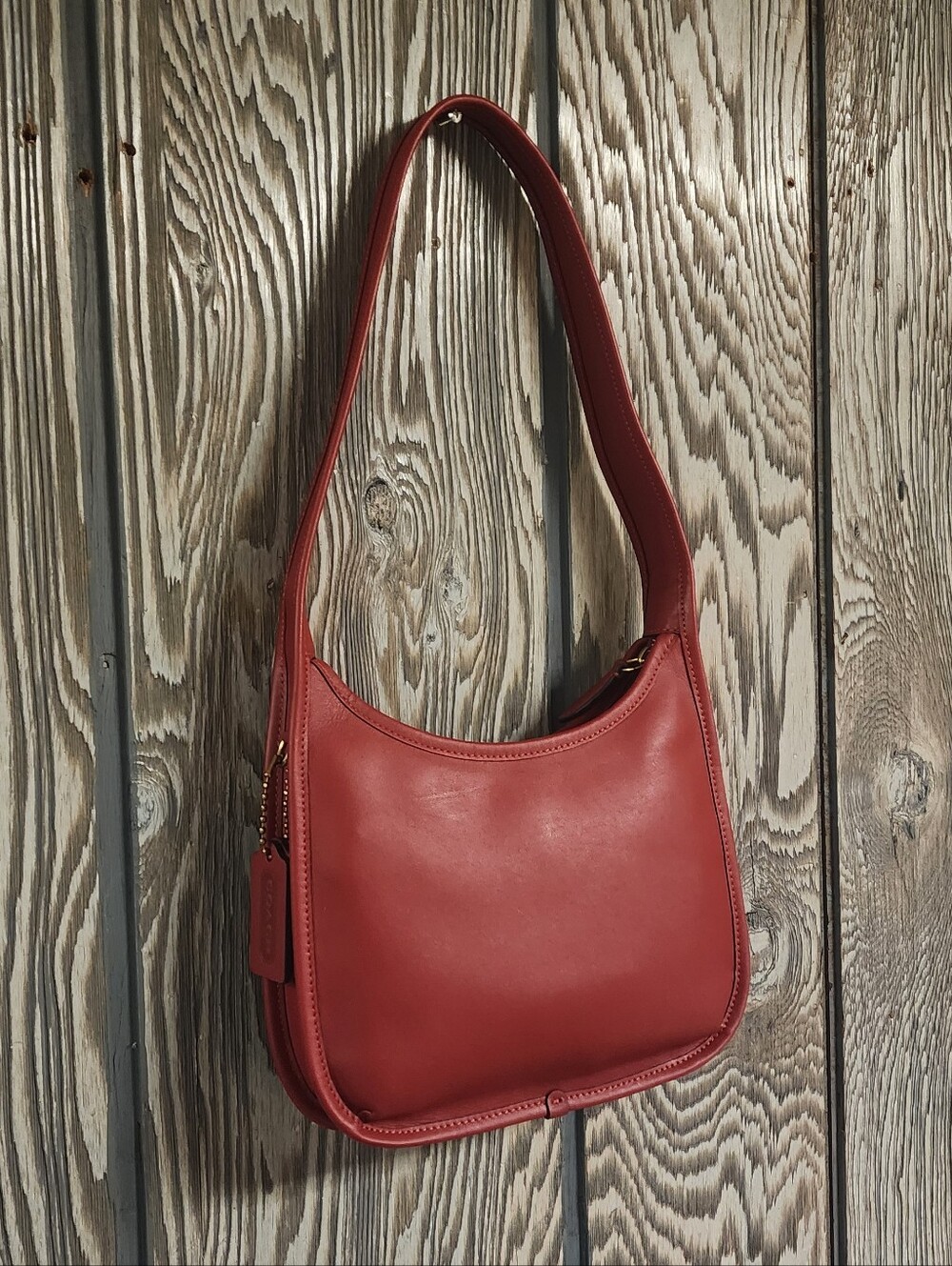 NWOT Coach Curve Zip (RED)